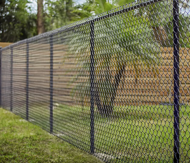 Black Vinyl Coated Chain Link Fence Installed In Pompano Beach